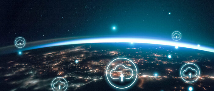 night image of sparkling cities and a sliver of daylight framing